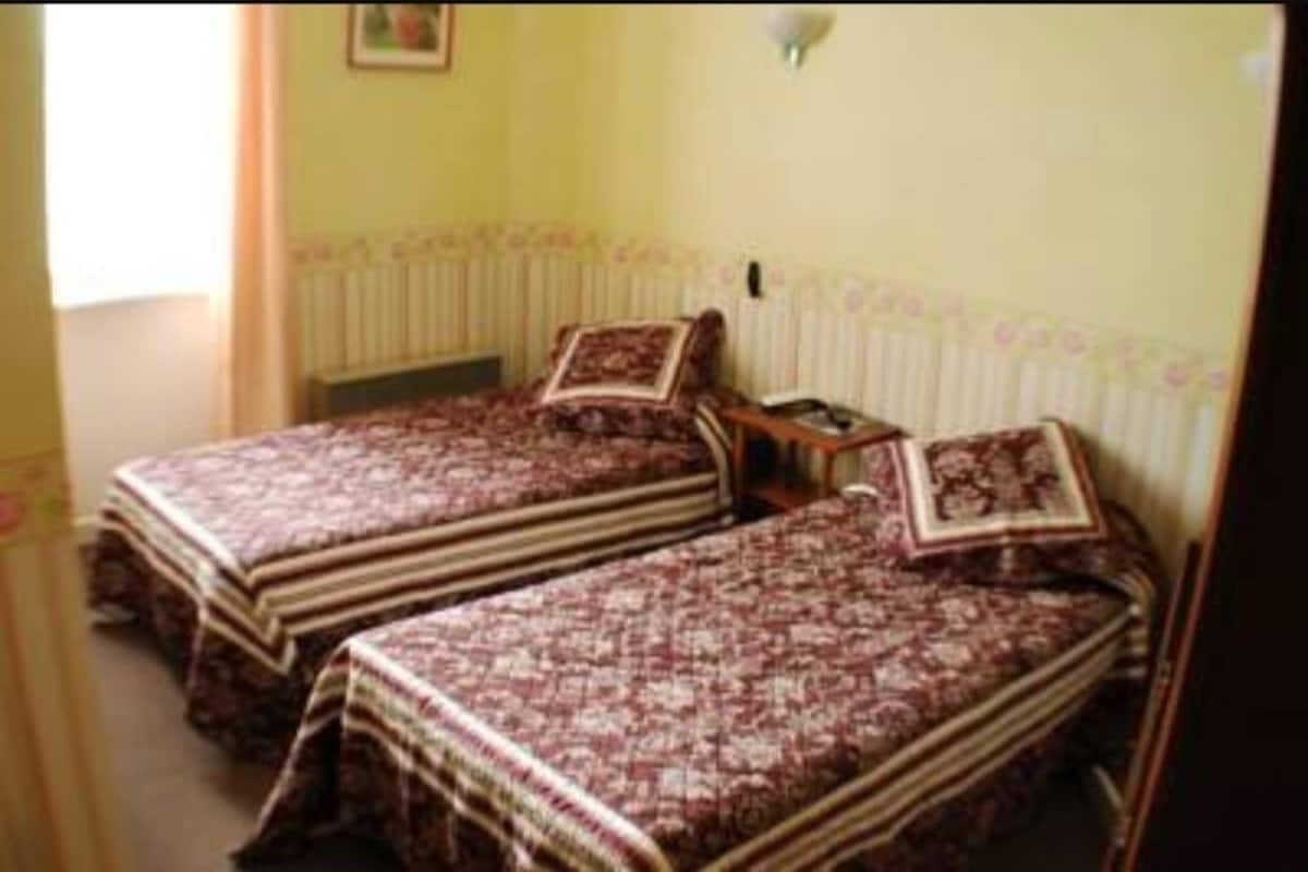 Premium bedding, desk, free cots/infant beds, rollaway beds