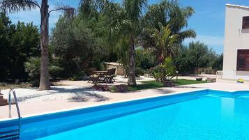 Seasonal outdoor pool, pool umbrellas, sun loungers