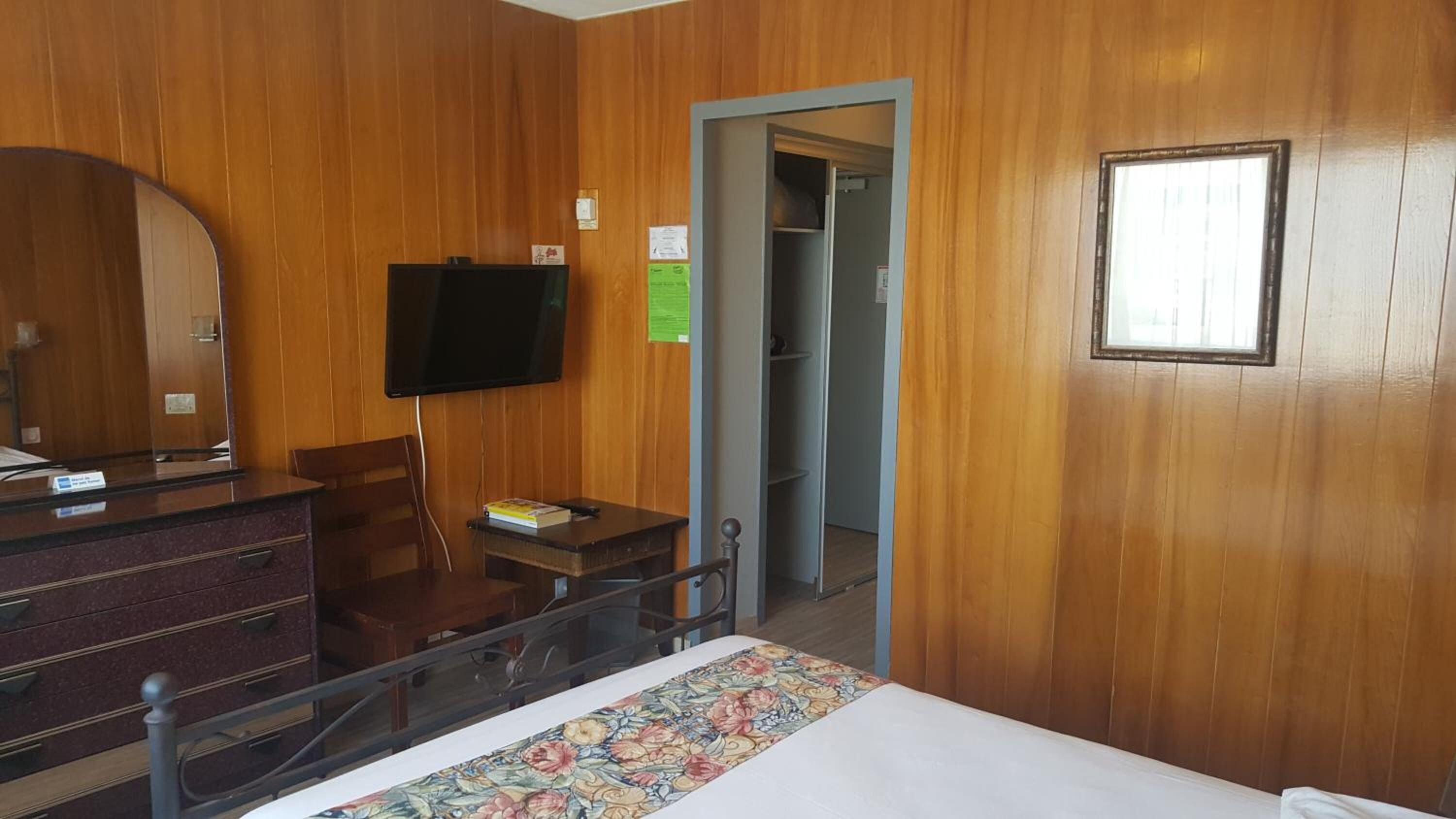 individually decorated, desk, iron/ironing board, rollaway beds