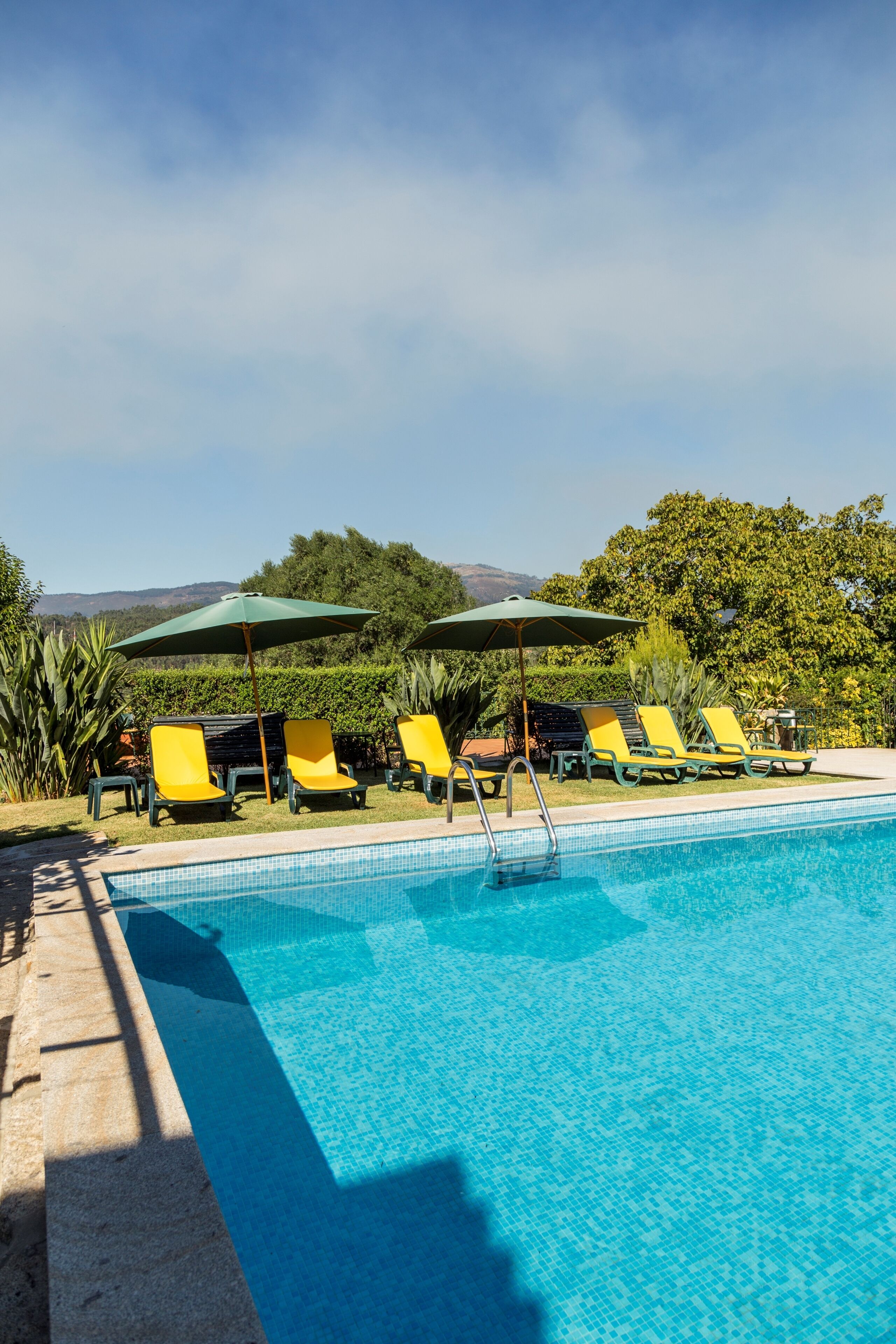 Seasonal outdoor pool, pool umbrellas, sun loungers