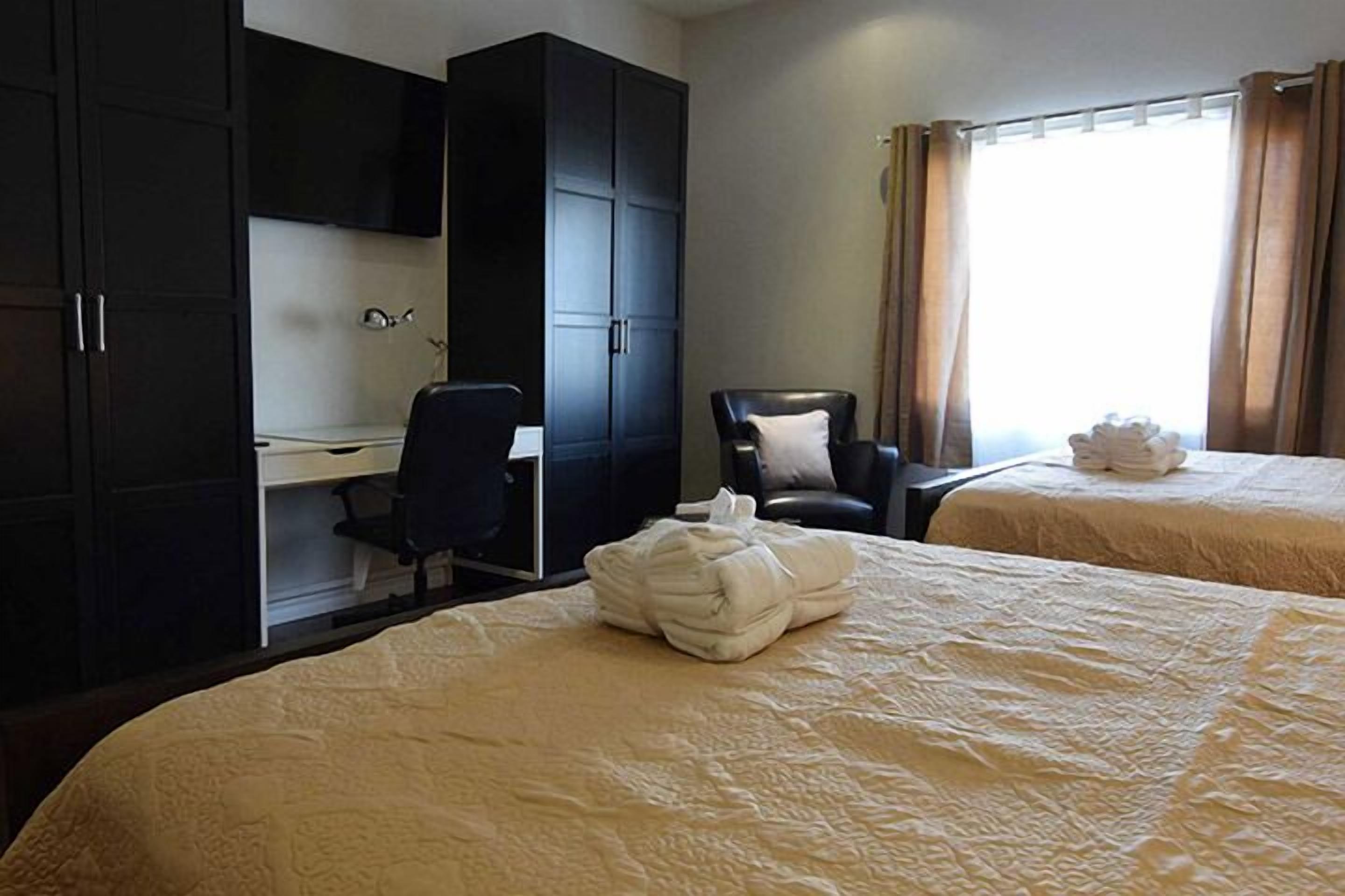 suite, 2 queen beds | premium bedding, desk, free wifi, bed sheets