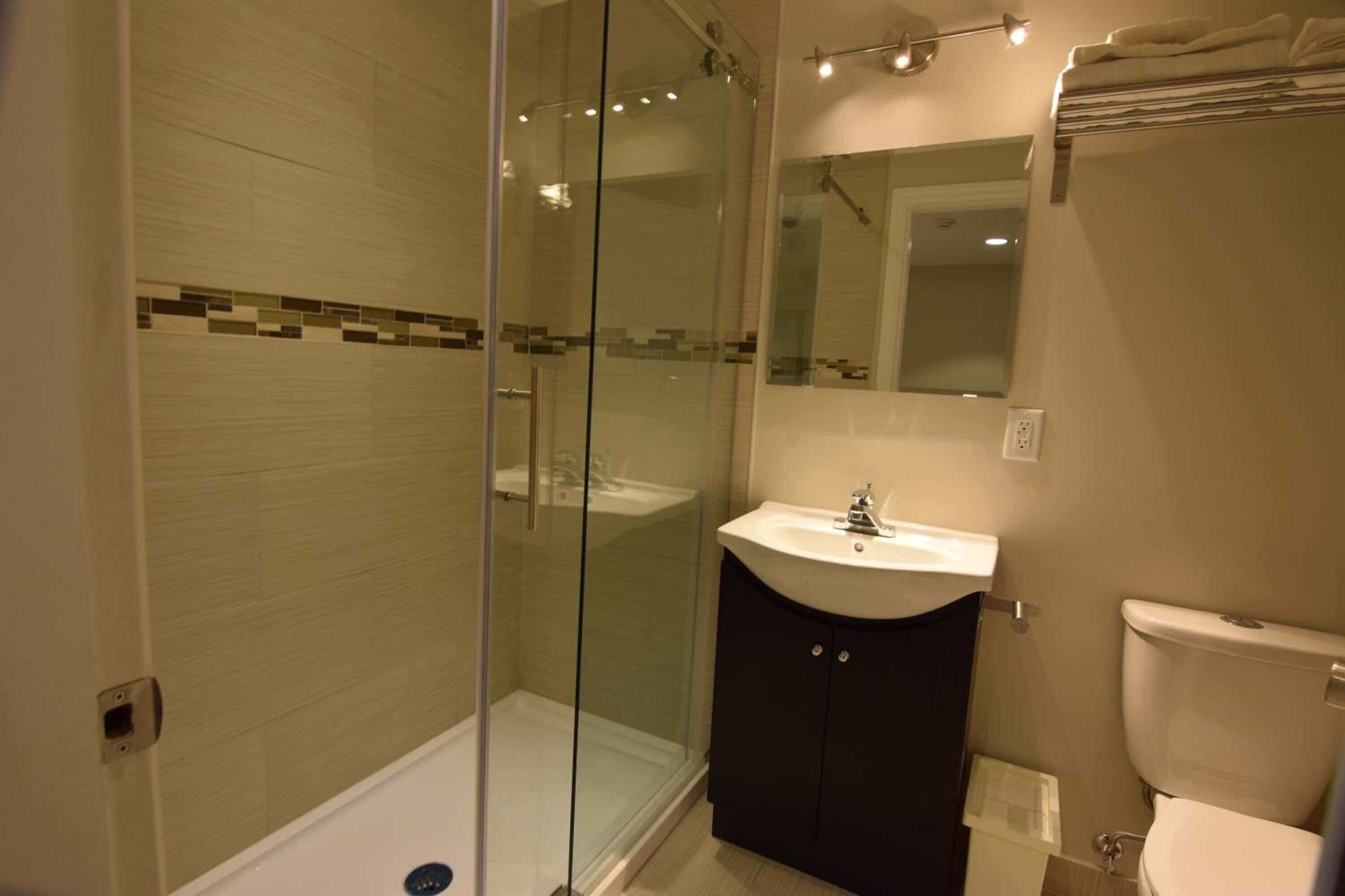 shower, free toiletries, towels, soap