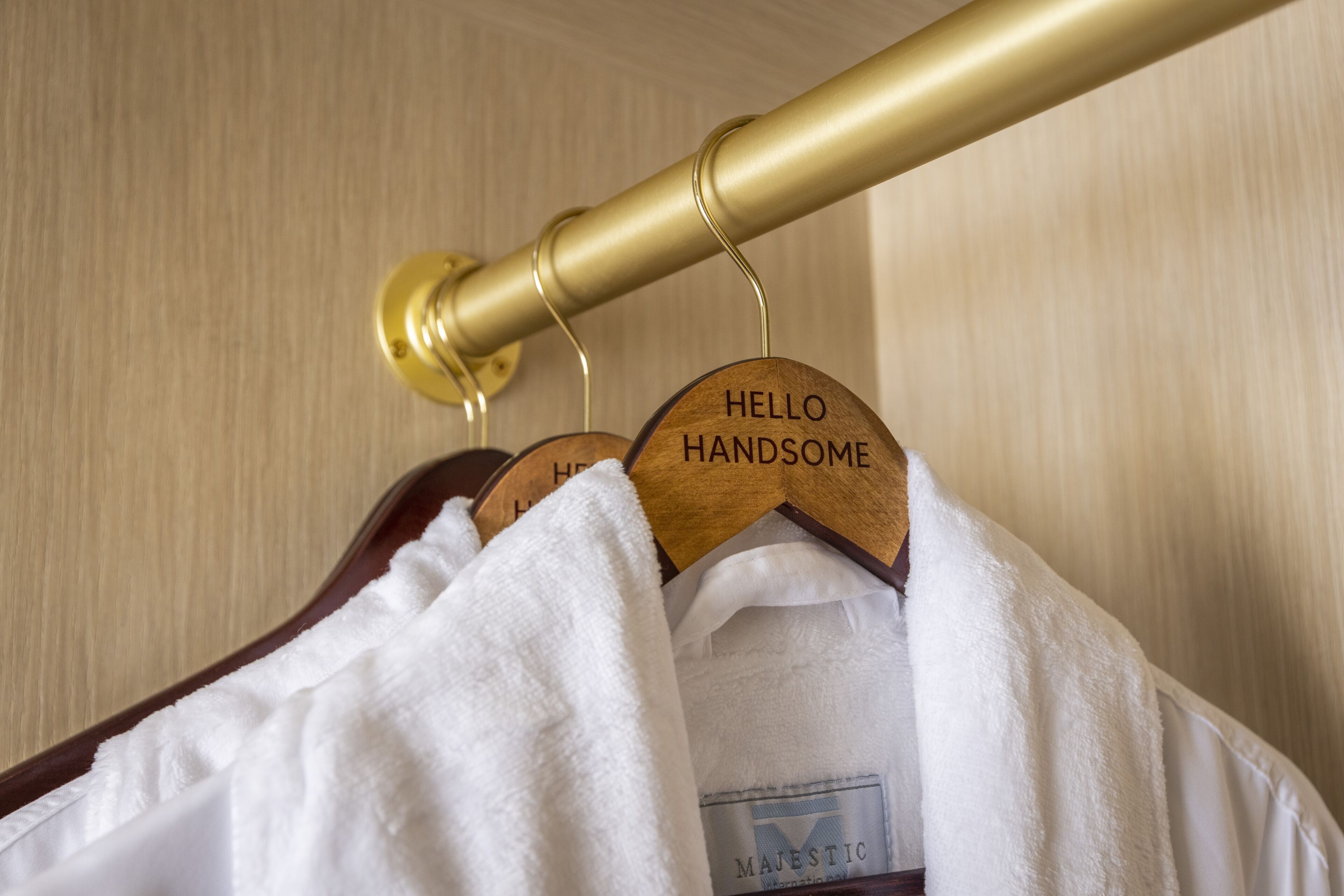 designer toiletries, hair dryer, towels, soap