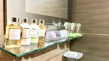 Shower, free toiletries, hair dryer, slippers