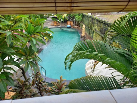 Outdoor pool, open 7:00 AM to 8:00 PM, pool umbrellas, sun loungers