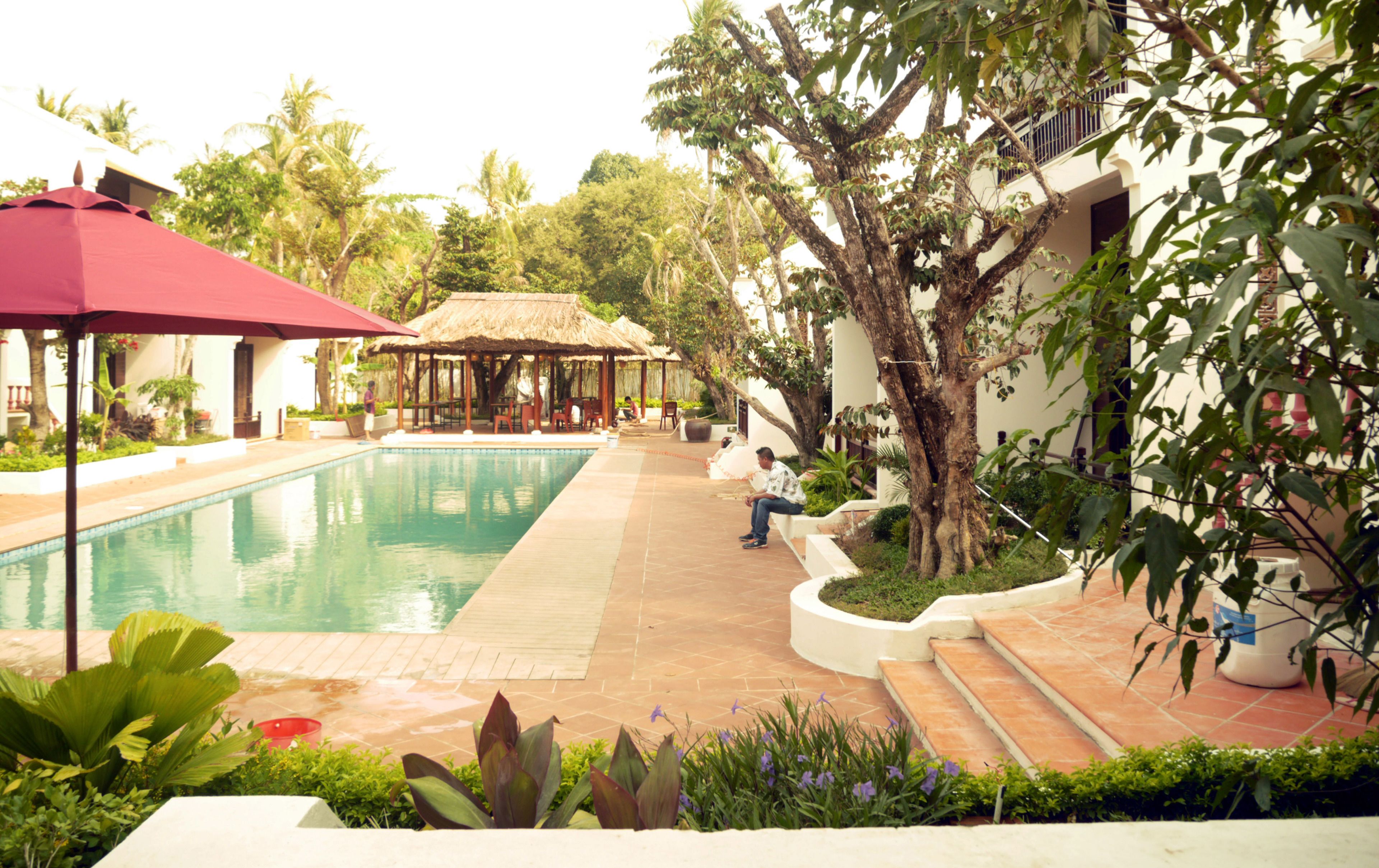 family twin room | living area | flat-screen tv