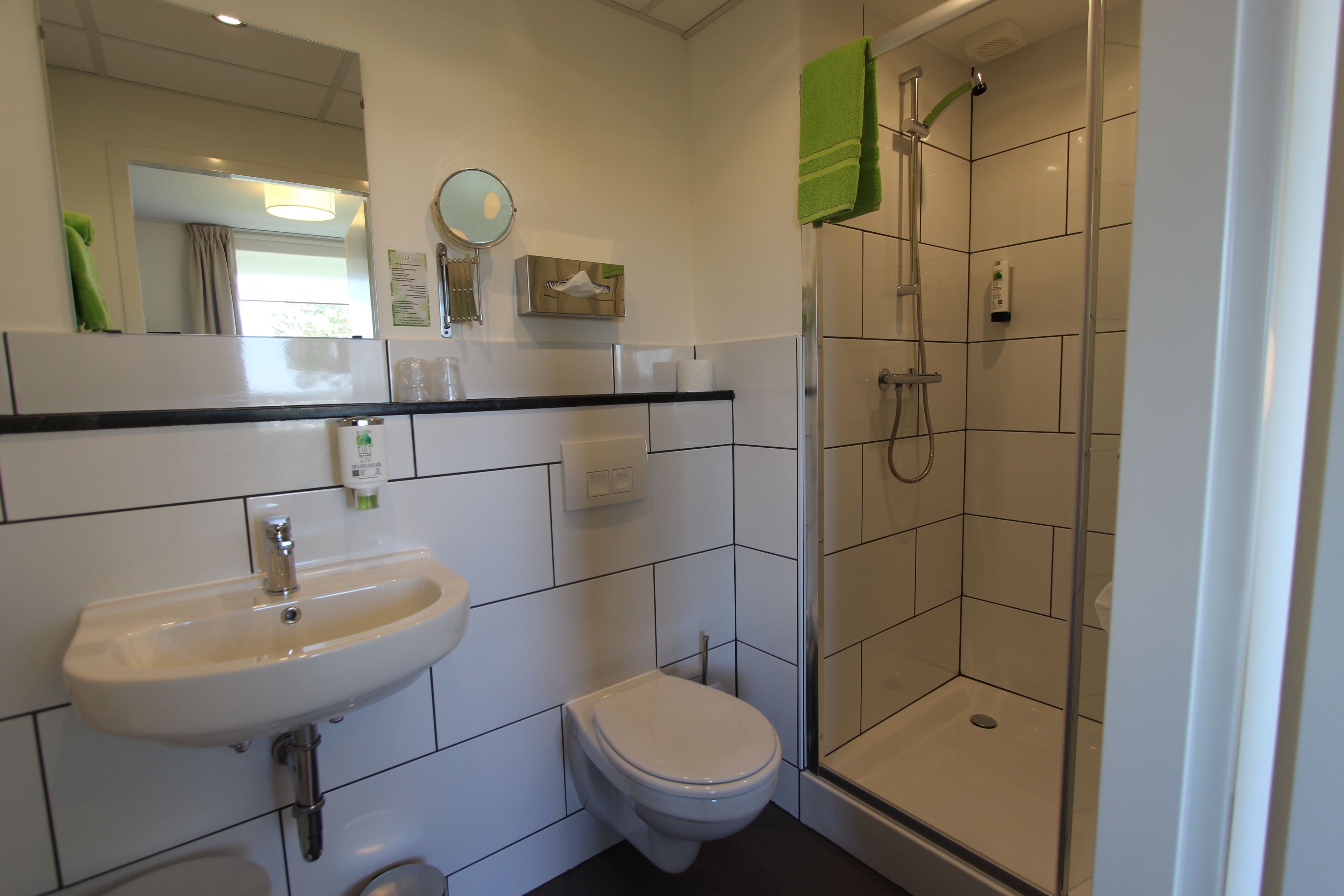 comfort double room, 1 king bed | bathroom | free toiletries, hair dryer, towels