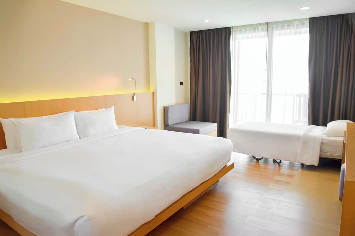 Family Executive Room with Balcony | 1 bedroom, in-room safe, individually decorated, individually furnished