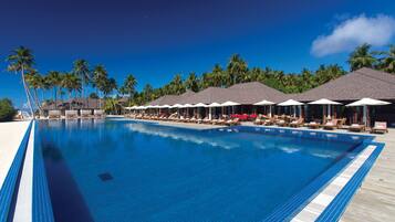 2 outdoor pools, open 9:00 AM to 7:00 PM, pool umbrellas, pool loungers