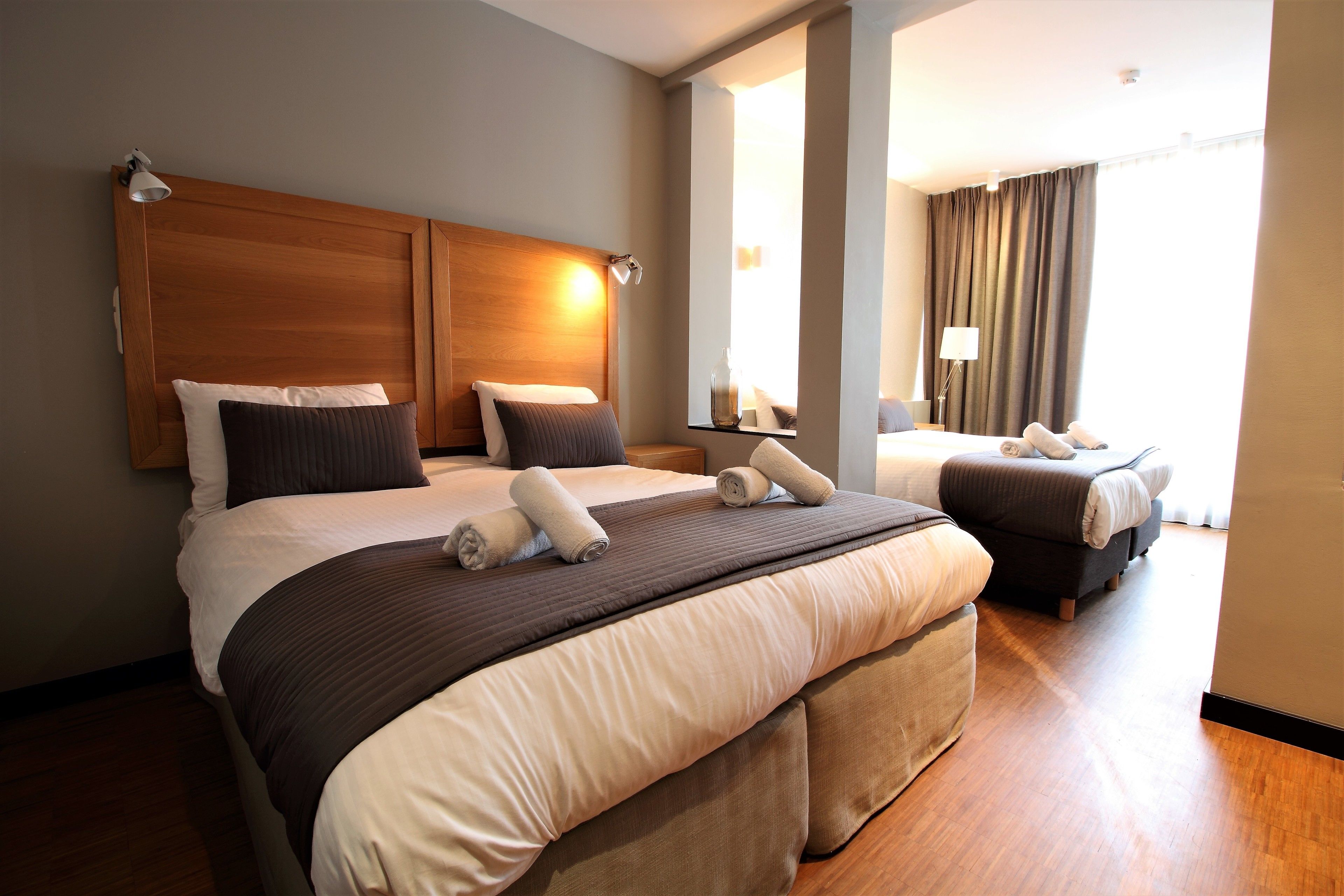 Family Room | In-room safe, desk, blackout drapes, iron/ironing board