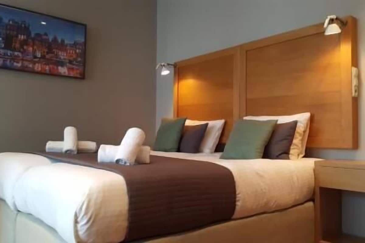 In-room safe, desk, blackout curtains, iron/ironing board