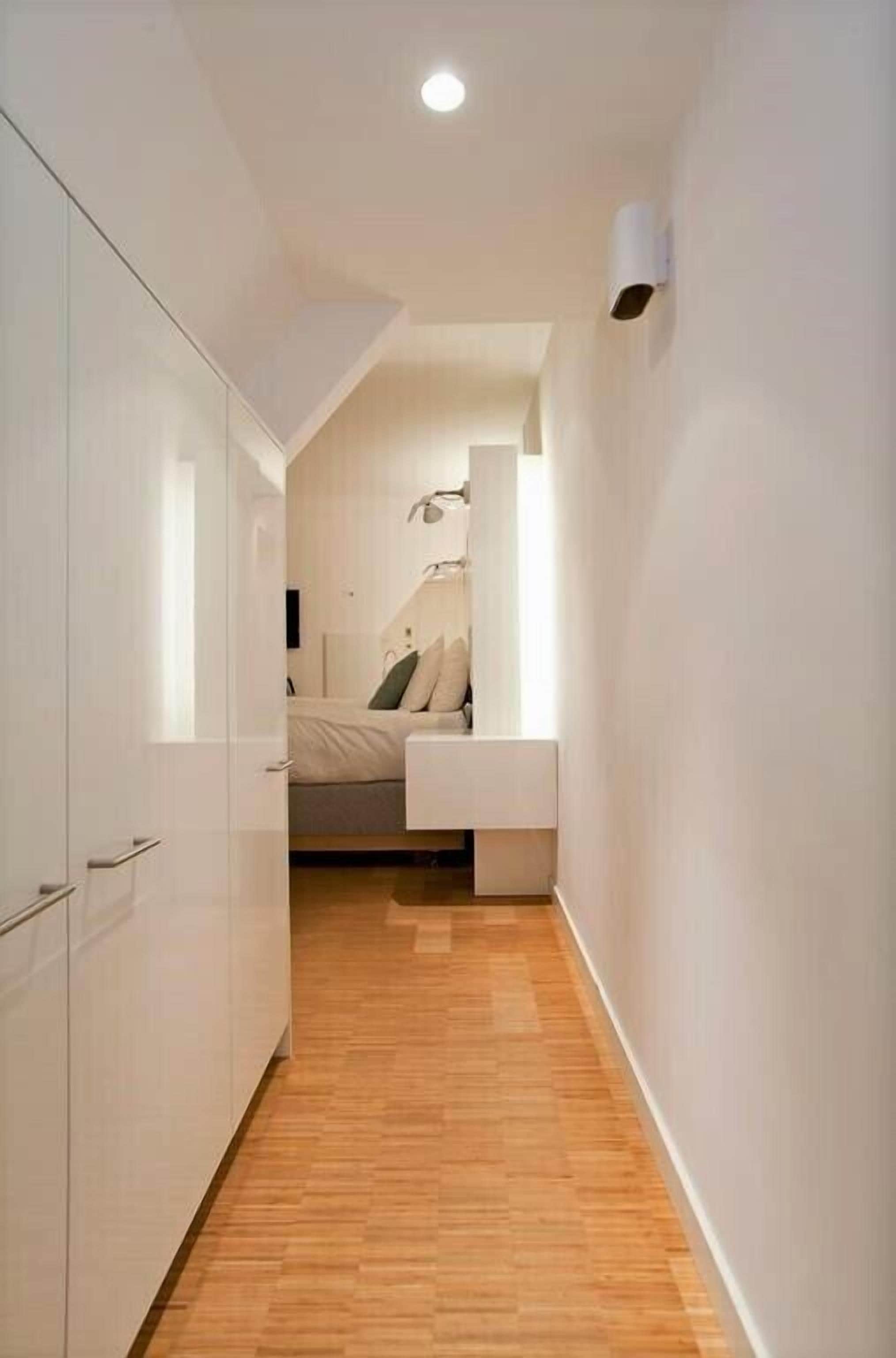 penthouse, city view | in-room safe, desk, blackout curtains, iron/ironing board