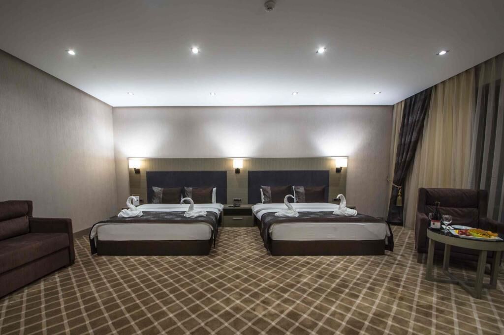 Biancheria da letto di alta qualità, minibar, cassaforte in camera