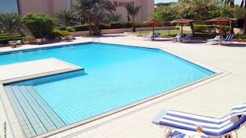 2 outdoor pools, pool umbrellas, pool loungers