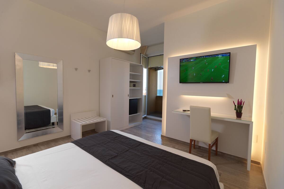 superior double room, sea view | in-room safe, desk, cots/infant beds, free wifi