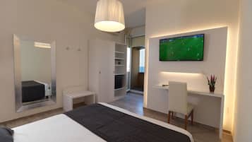 Habitación doble superior, vista al mar | Caja de seguridad en la habitación, escritorio, cunas y wifi gratis