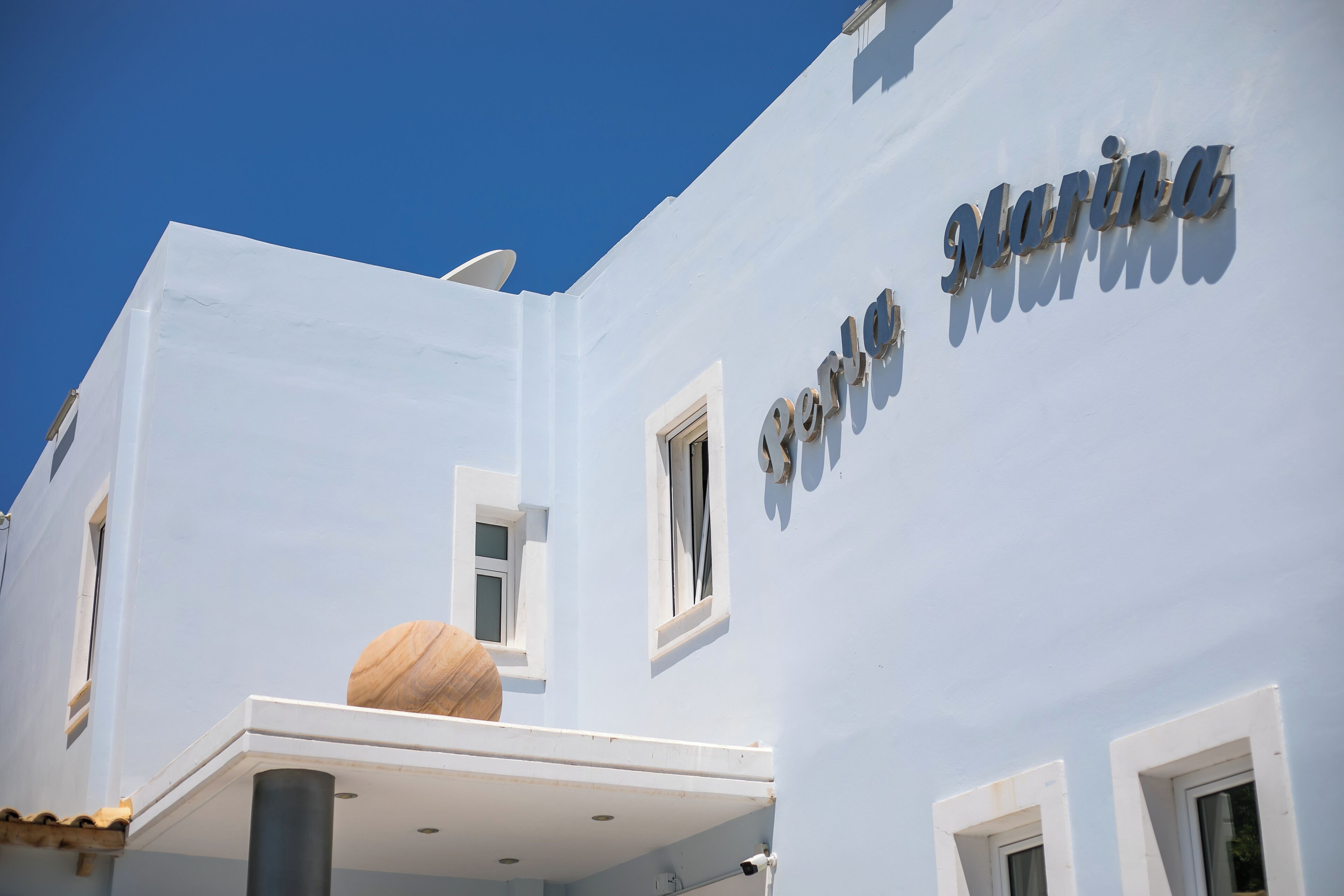 A building with the name 'Marina' on its facade.