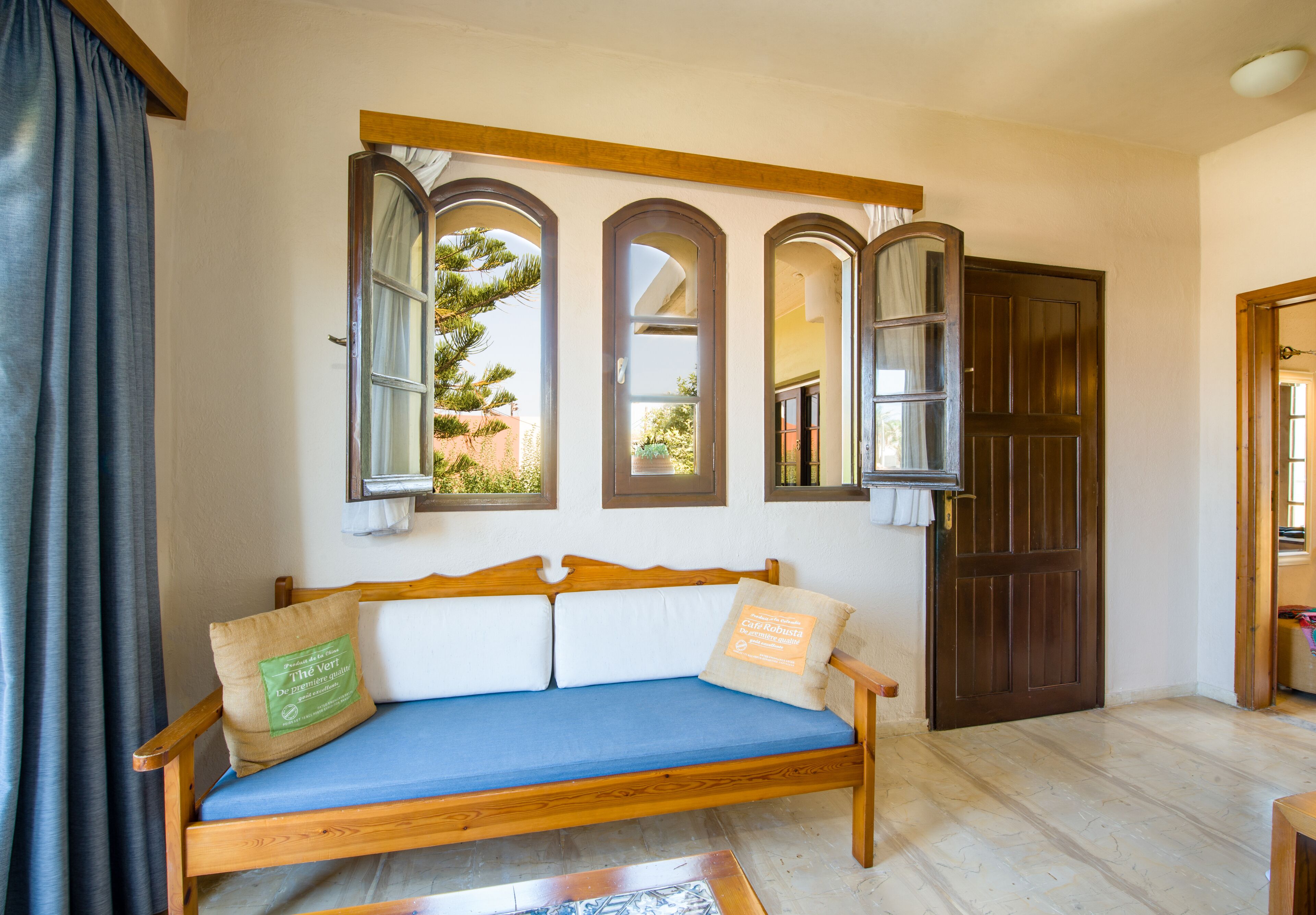 family apartment, 1 bedroom, garden view | living area | flat-screen tv, toys