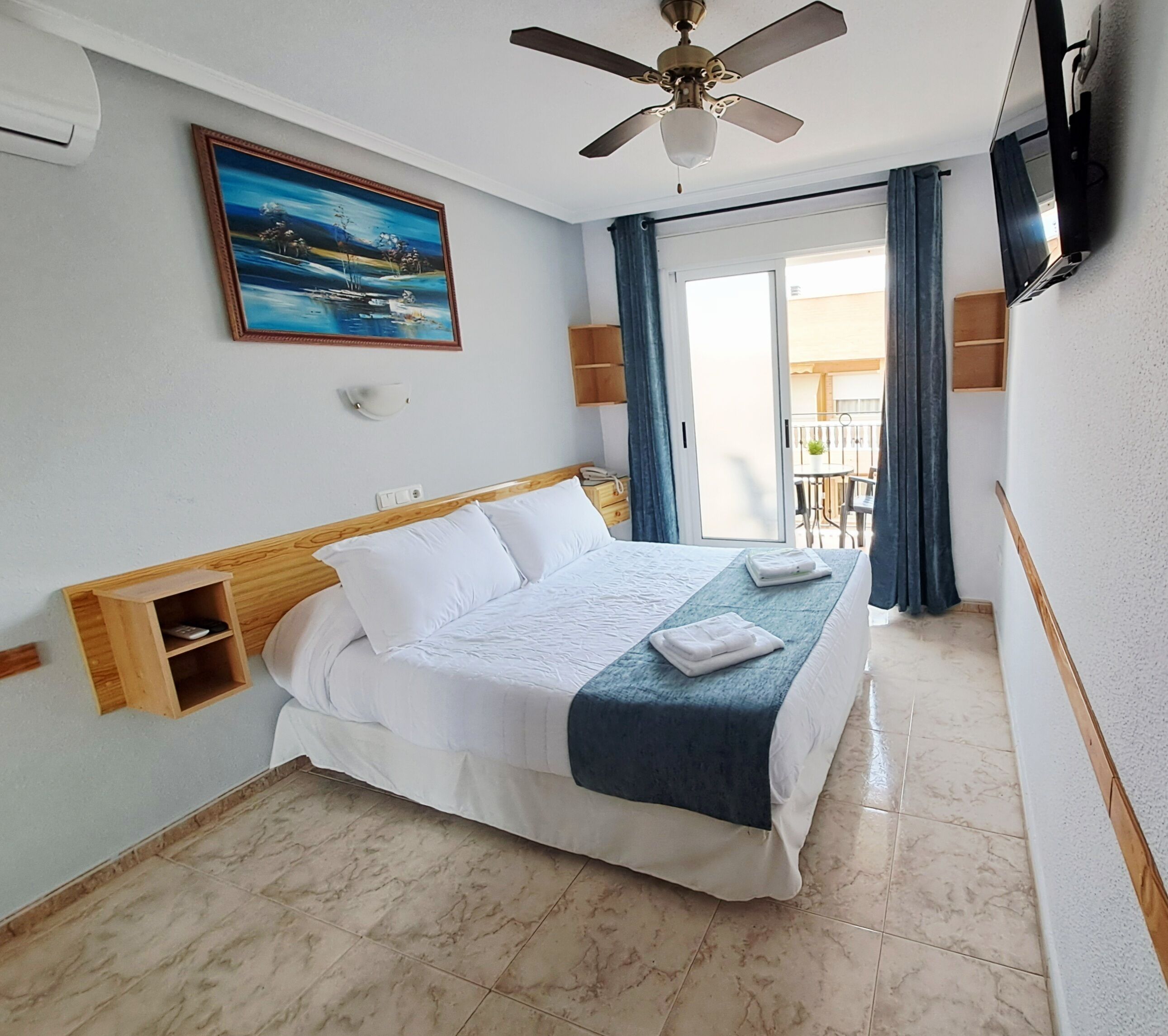 Double Room, Terrace, Sea View | Minibar, individually decorated, individually furnished, desk