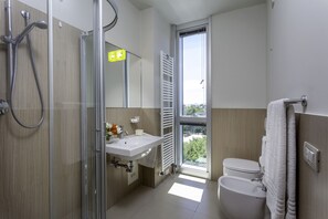 Shower, free toiletries, hair dryer, bidet