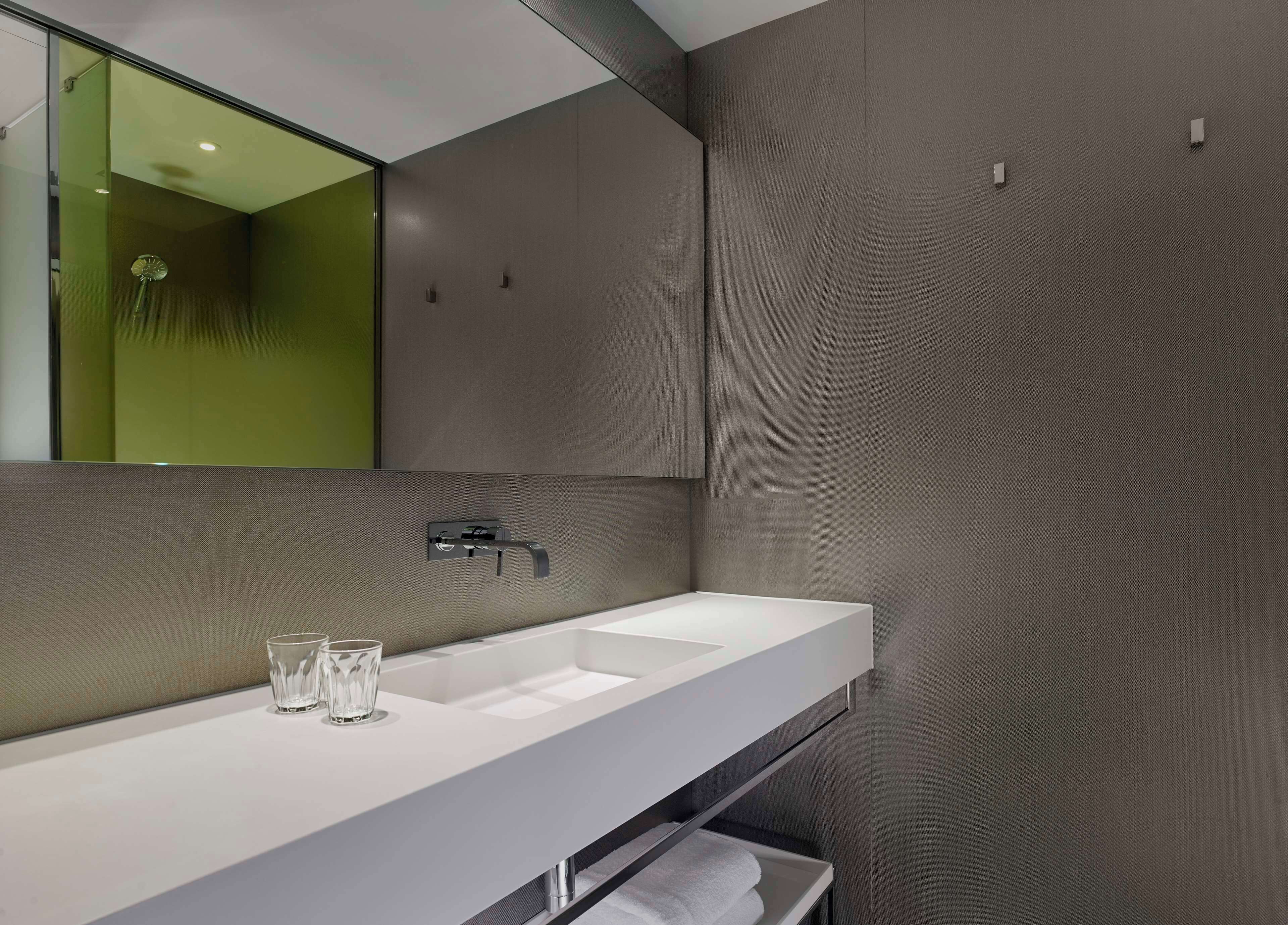 shower, designer toiletries, hair dryer, towels