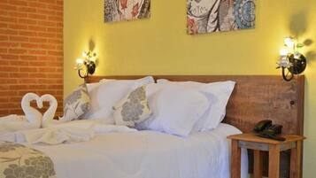 Chalé superior | Frigobar, individualmente decorados, individualmente mobiliados