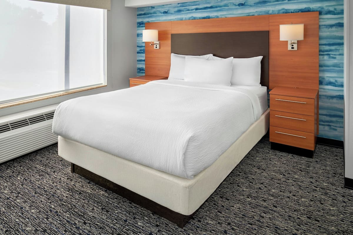 Suite, 1 Bedroom, Non Smoking, City View | Premium bedding, pillowtop beds, iron/ironing board