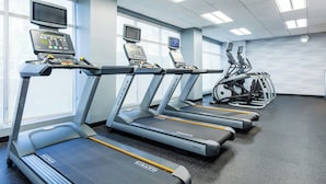 A gym with treadmills, exercise bikes, and a rowing machine. - Fairfield Inn & Suites Richmond Midlothian (Richmond)