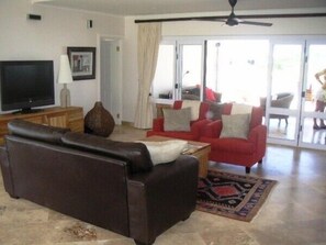 Standard House | Living area | Flat-screen TV, DVD player - Waterside Living Marina Martinique 1394 (Jeffreys Bay)