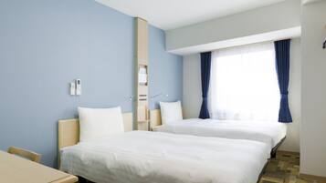 Desk, laptop workspace, free WiFi, bed sheets