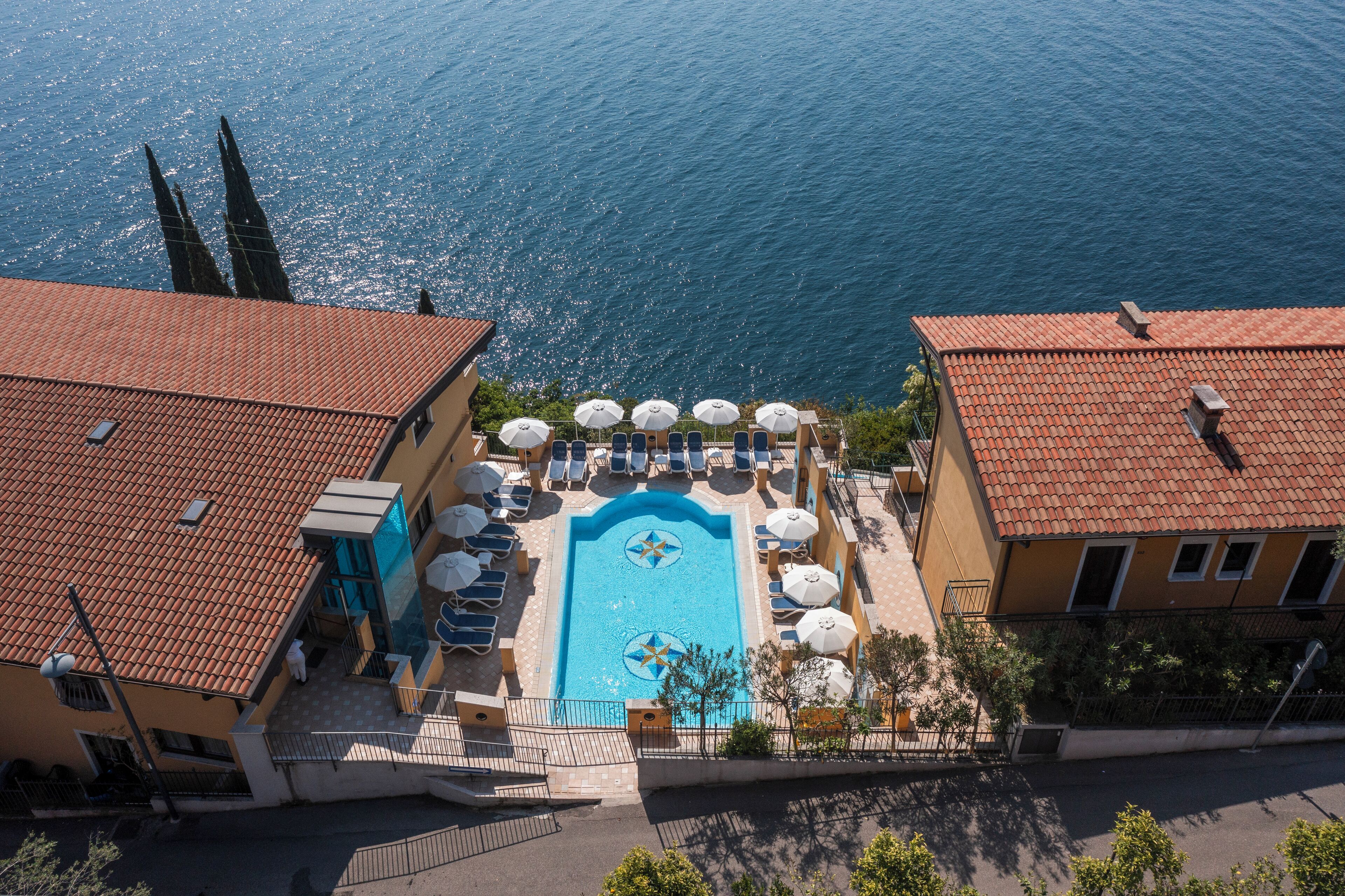 3 outdoor pools, pool umbrellas, pool loungers