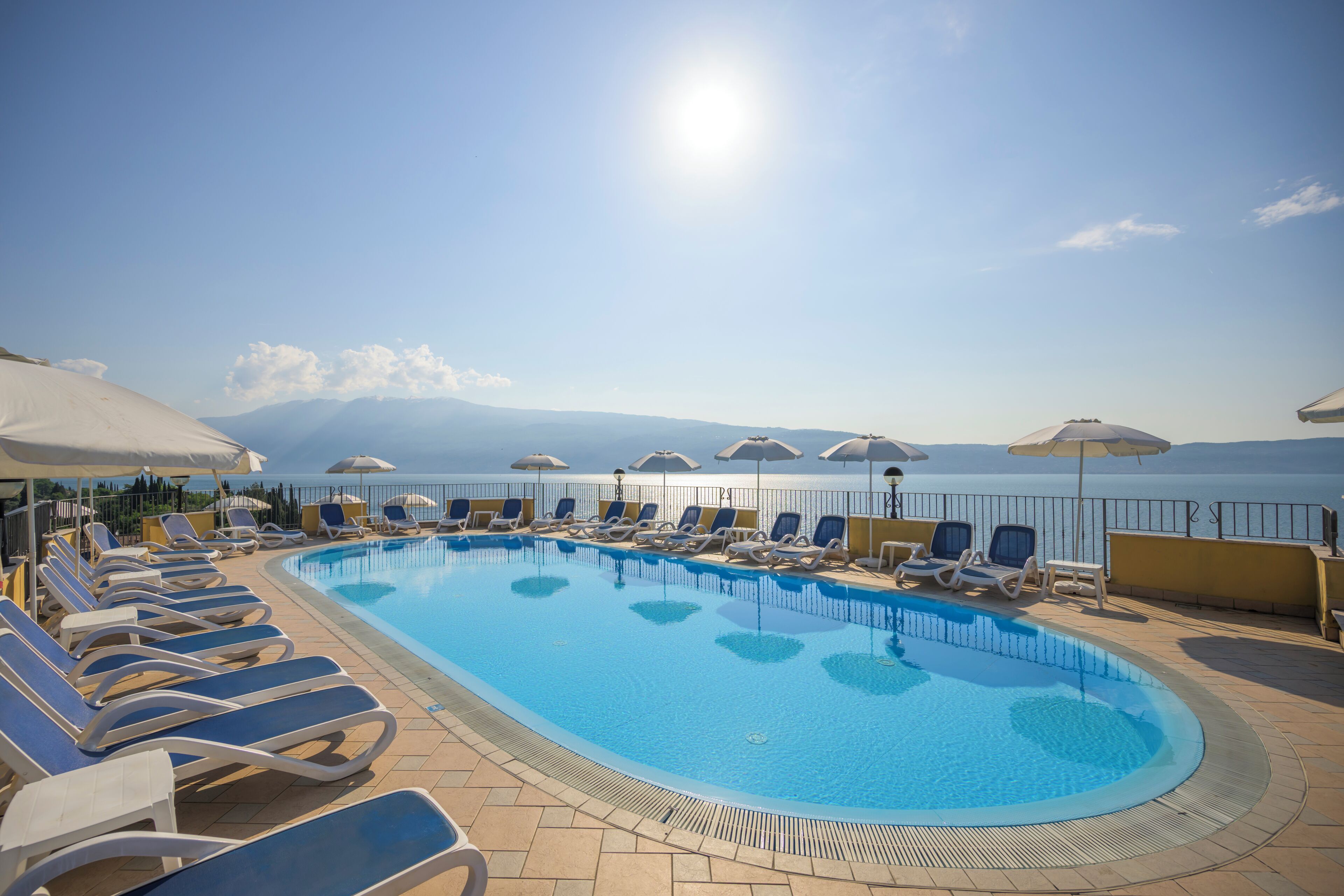 3 outdoor pools, pool umbrellas, pool loungers