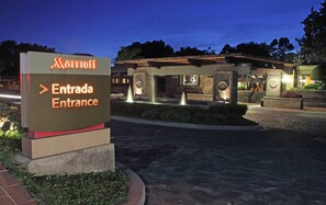 A Marriott hotel entrance sign with a clear pathway leading to the building. - Marriott Puebla Hotel Meson del Angel (Puebla)