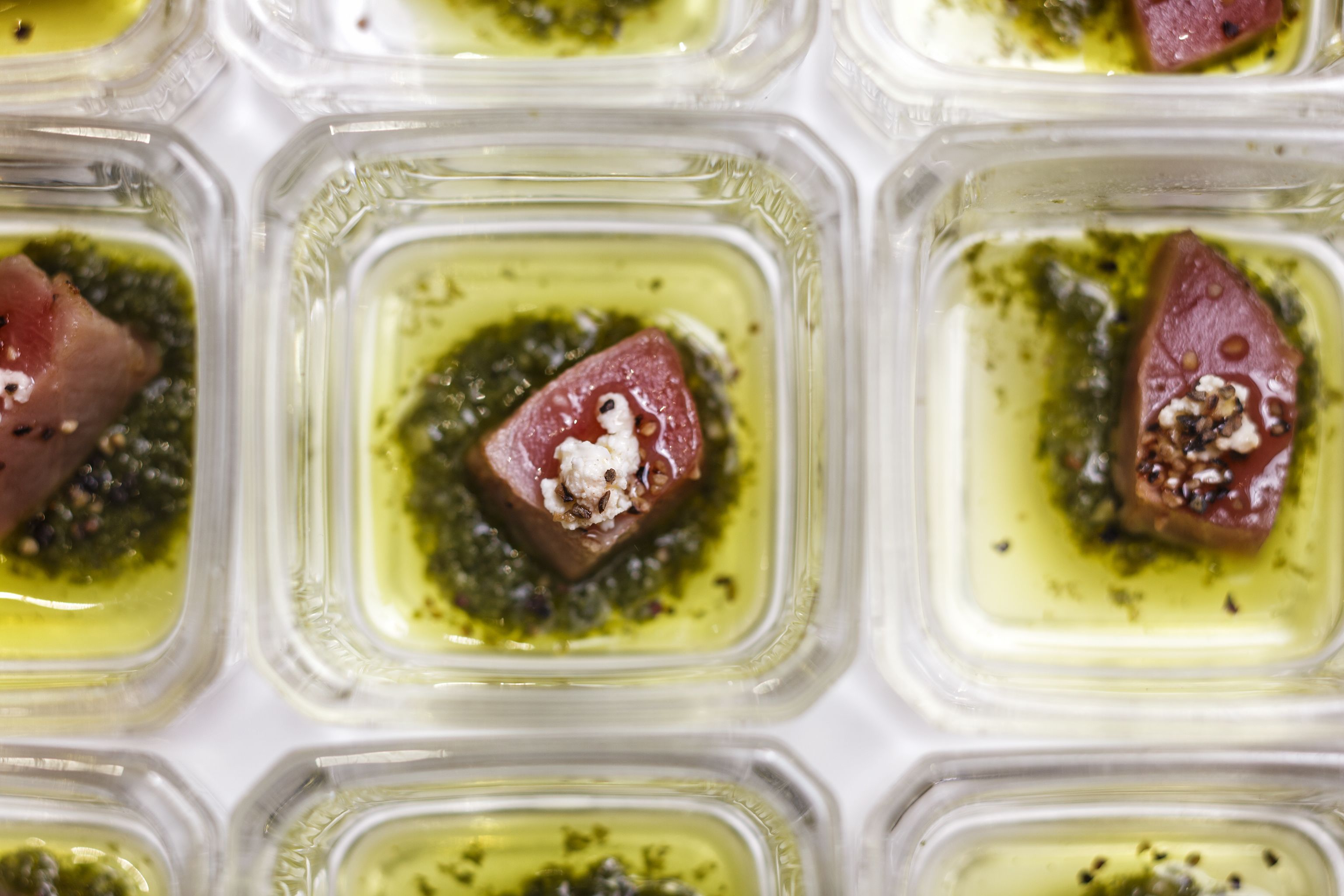 A close-up of food items in clear containers.