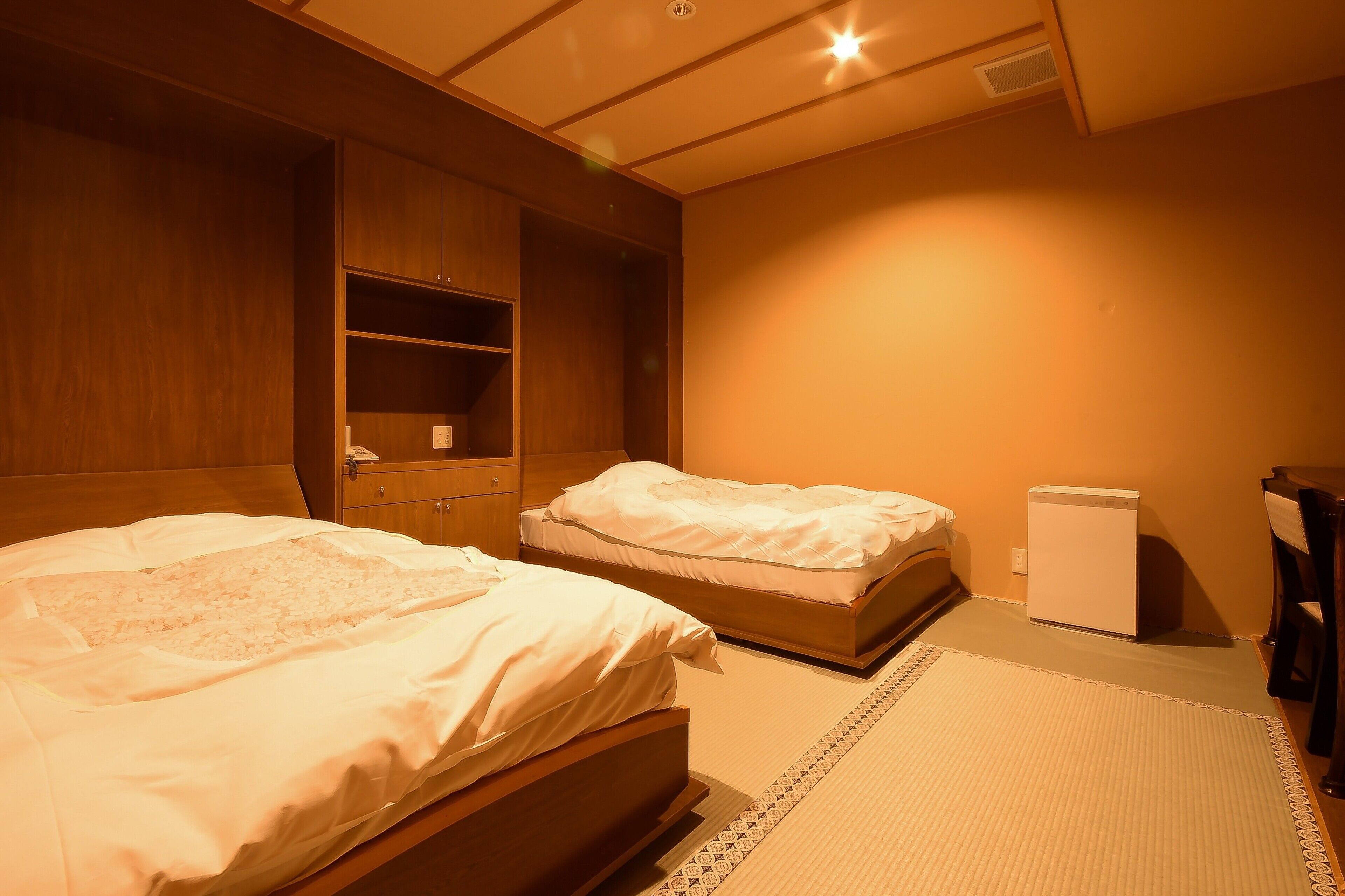 Suite, Non Smoking, Garden View | Down comforters, in-room safe, desk, free WiFi