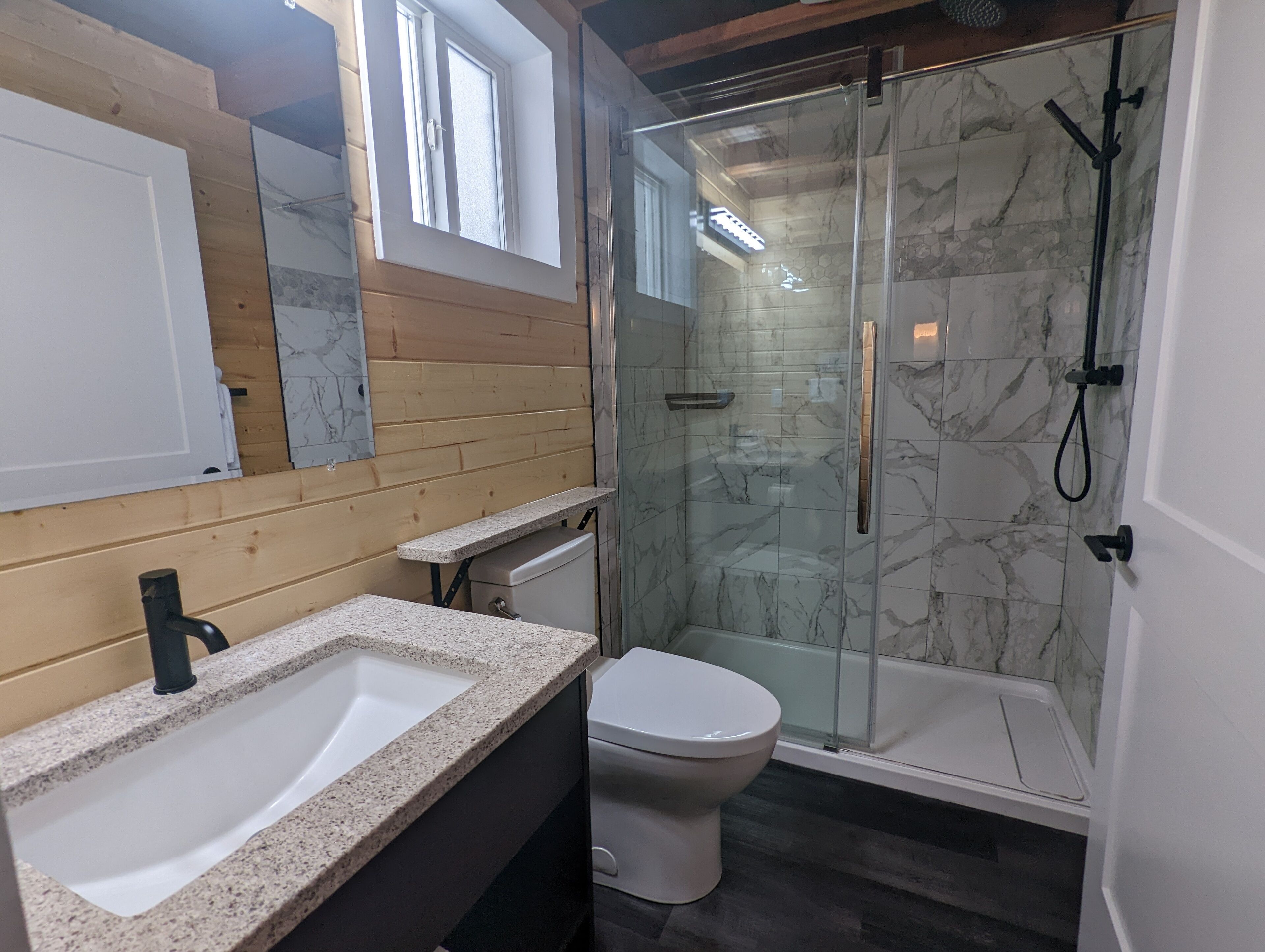 deluxe loft, multiple beds | bathroom | free toiletries, hair dryer, bathrobes, towels