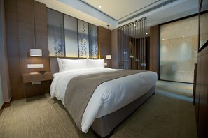 Quarto executivo, 1 cama King | Frigobar, cofres nos quartos, escrivaninha, cortinas blackout