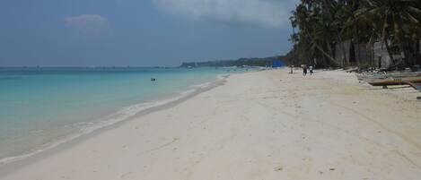 Beach nearby, white sand, beach towels, beach yoga