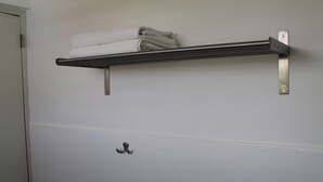 A white door with a towel rack above it. - Roger's Place Gay Guesthouse - Caters to Gay Men (Boracay Island)