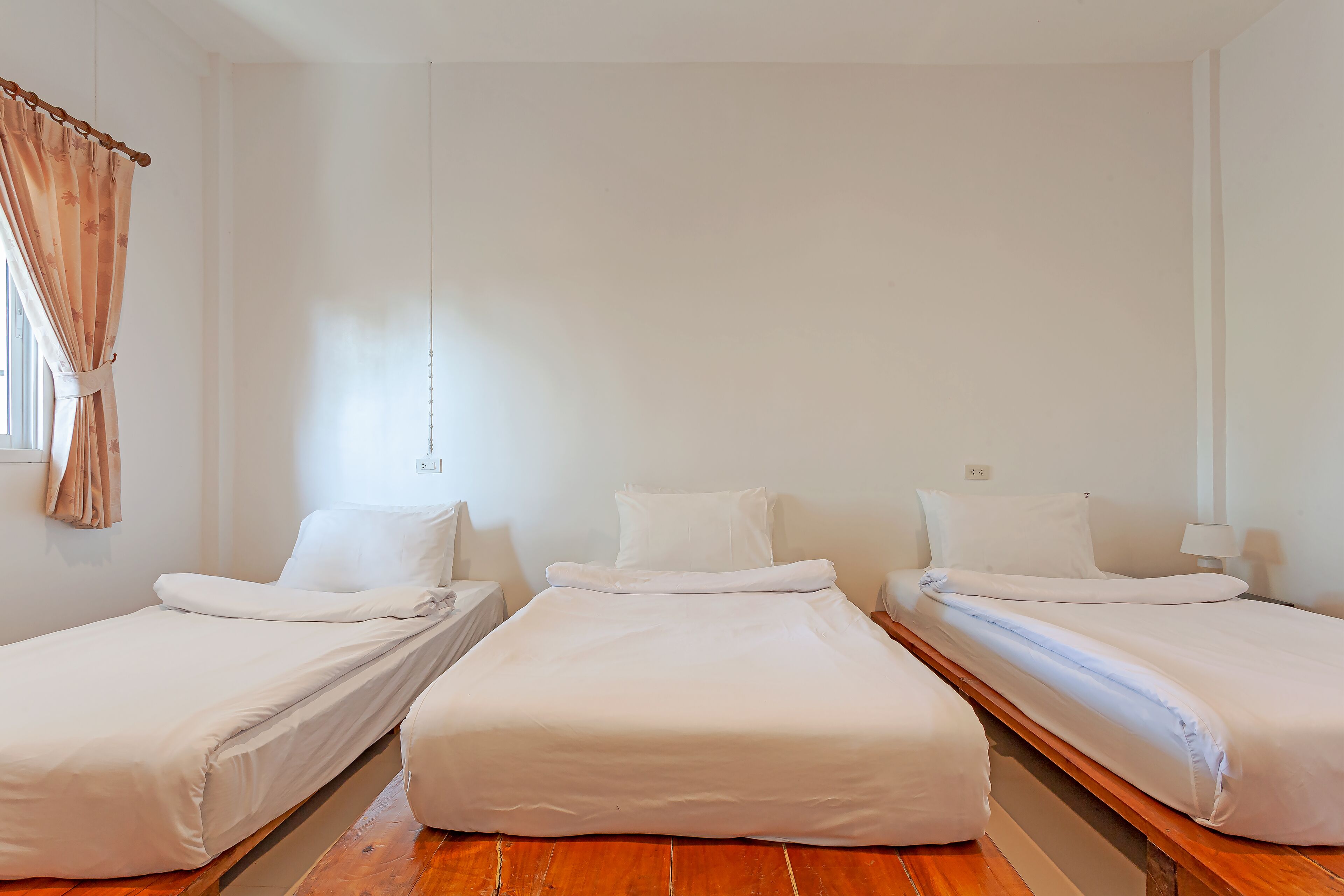Deluxe Triple Beds Room Garden View | Desk, blackout curtains, free WiFi, bed sheets