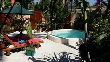 Indoor pool, pool umbrellas, sun loungers