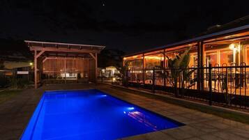 Outdoor pool, open 8:00 AM to 6:00 PM, pool loungers