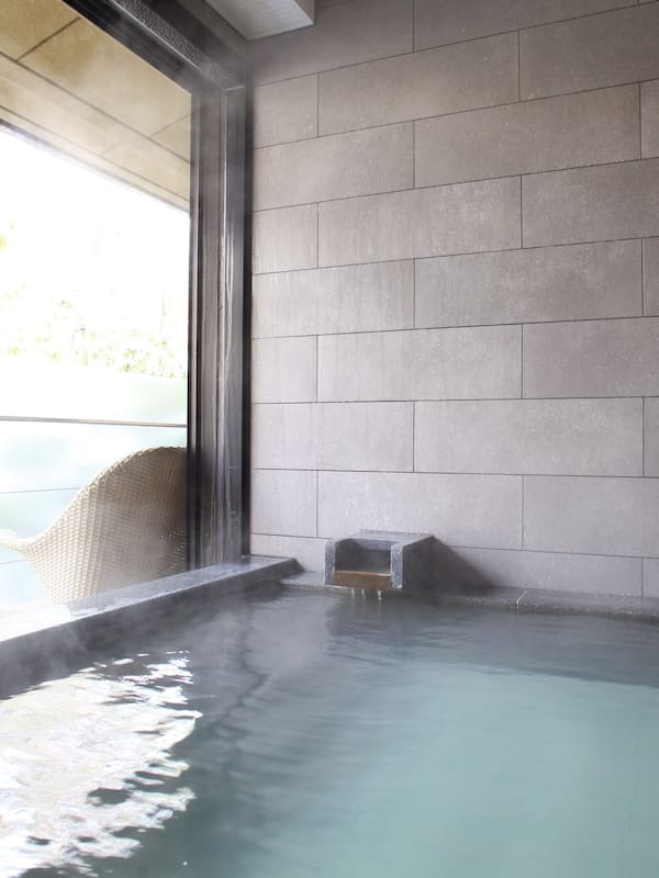 Separate tub and shower, spring water tub, designer toiletries