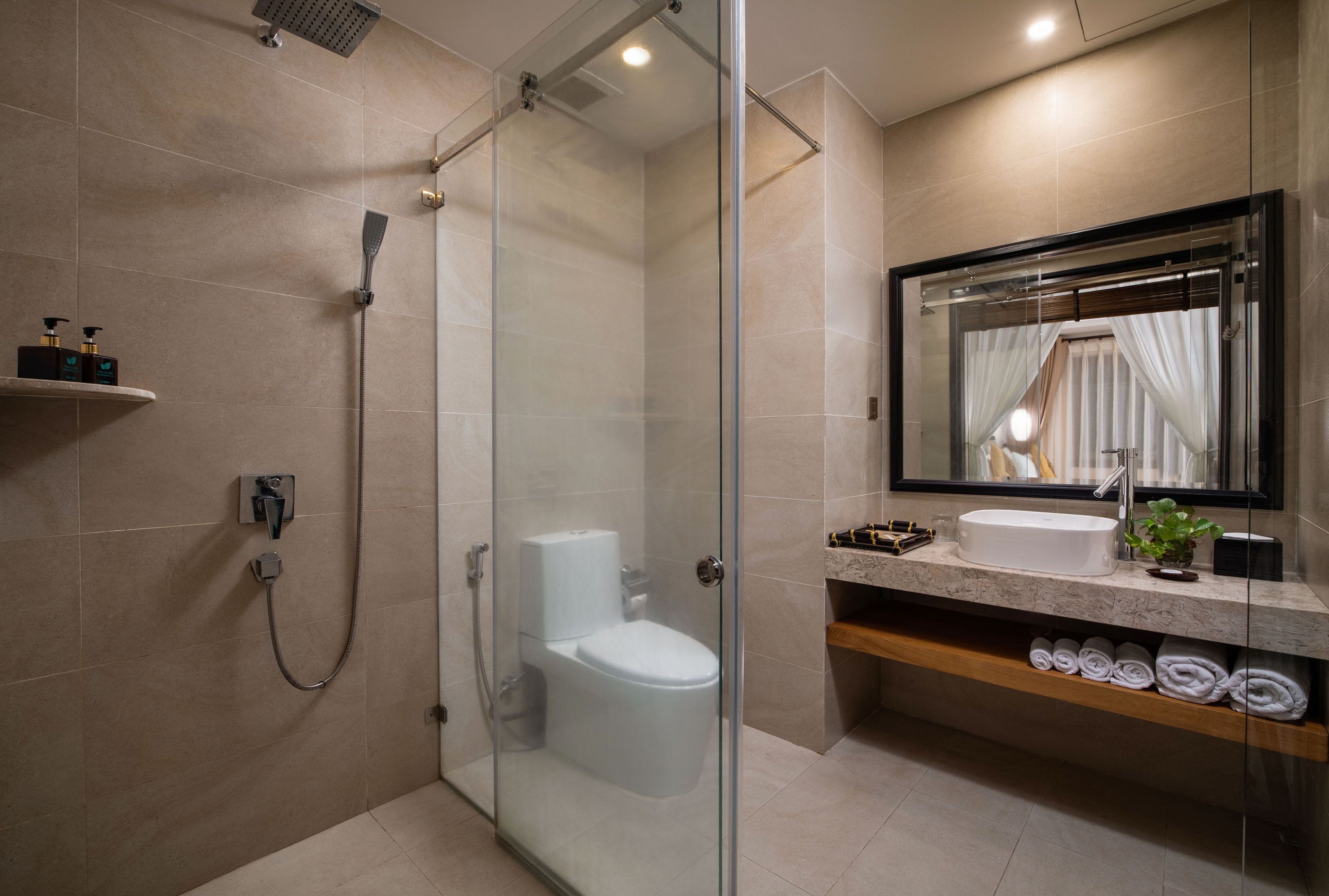 combined shower/bathtub, deep-soaking bathtub, designer toiletries