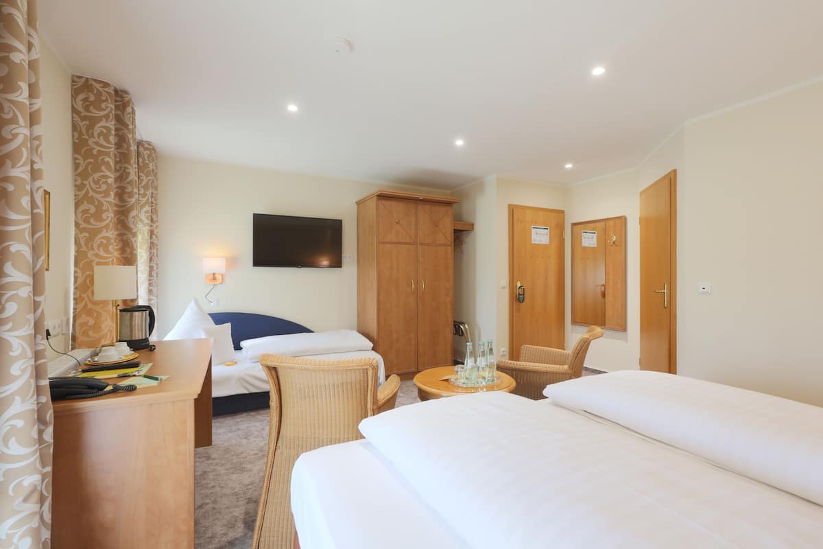 family triple room | premium bedding, in-room safe, desk, soundproofing