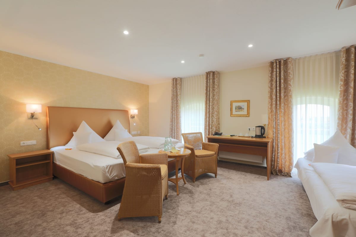 family triple room | premium bedding, in-room safe, desk, soundproofing