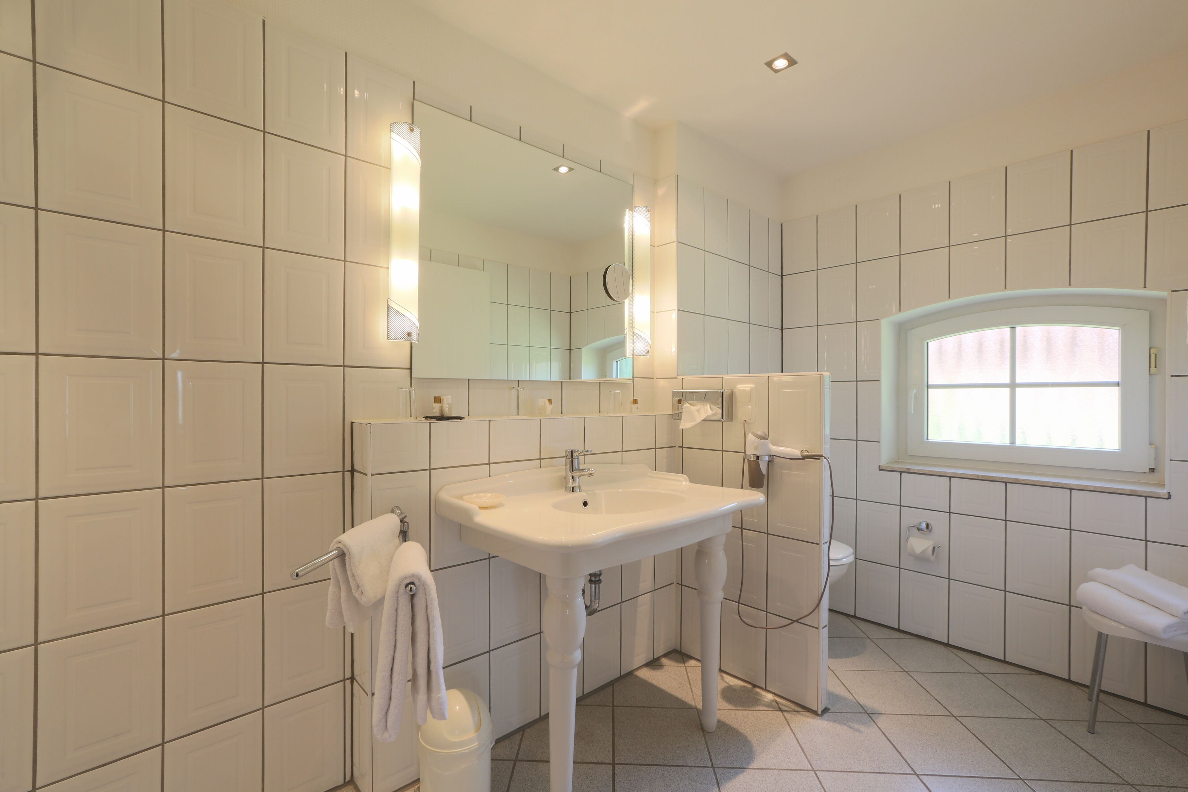 family triple room | bathroom | free toiletries, slippers, towels