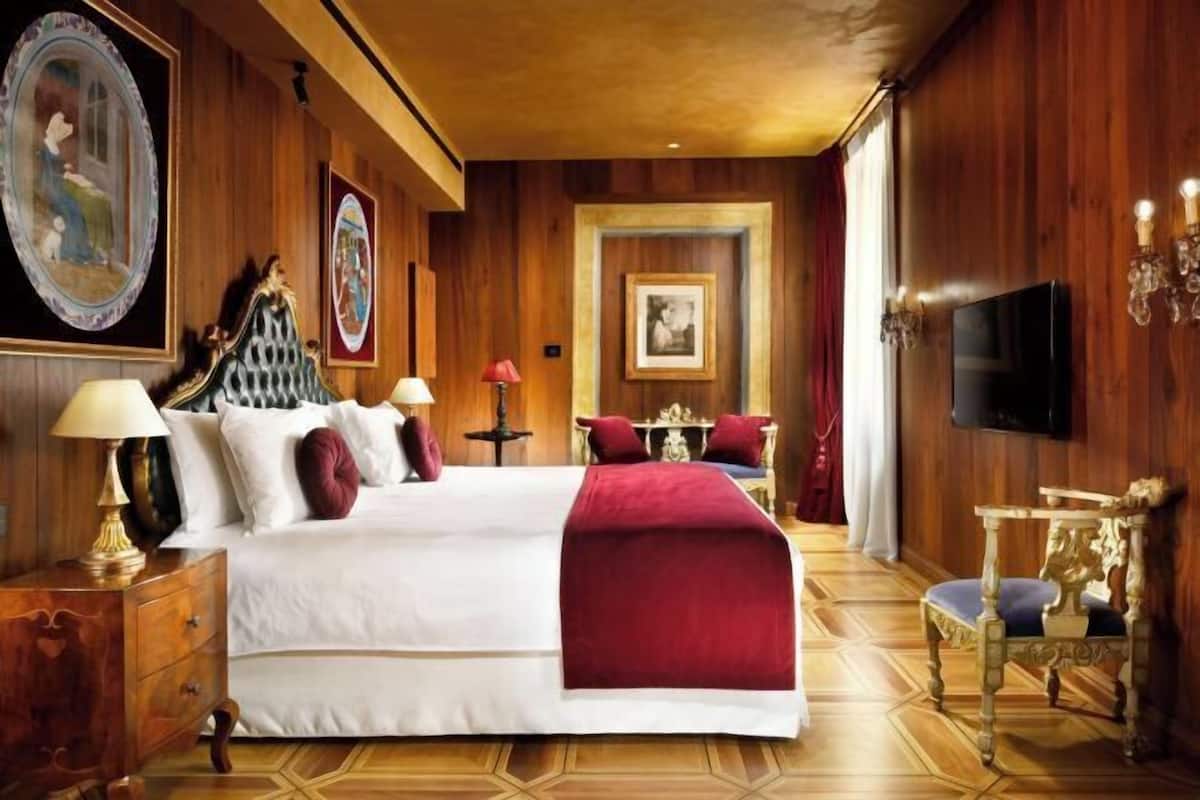 2 habitaciones, ropa de cama de alta calidad y minibar