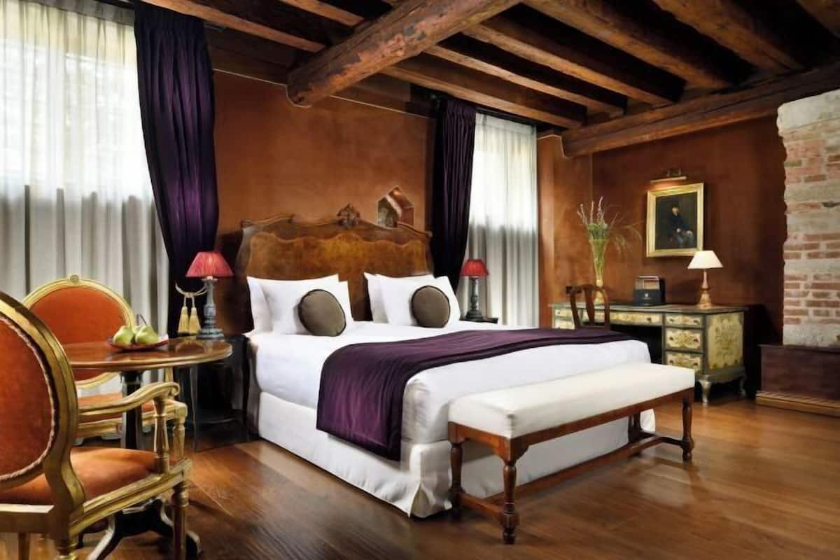 2 habitaciones, ropa de cama de alta calidad y minibar