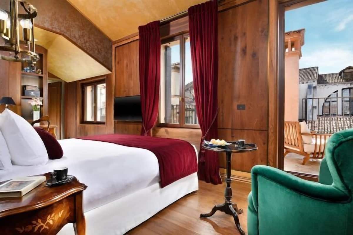2 habitaciones, ropa de cama de alta calidad y minibar